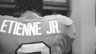 Etienne's jersey retired, brother leads Jennings to playoff win